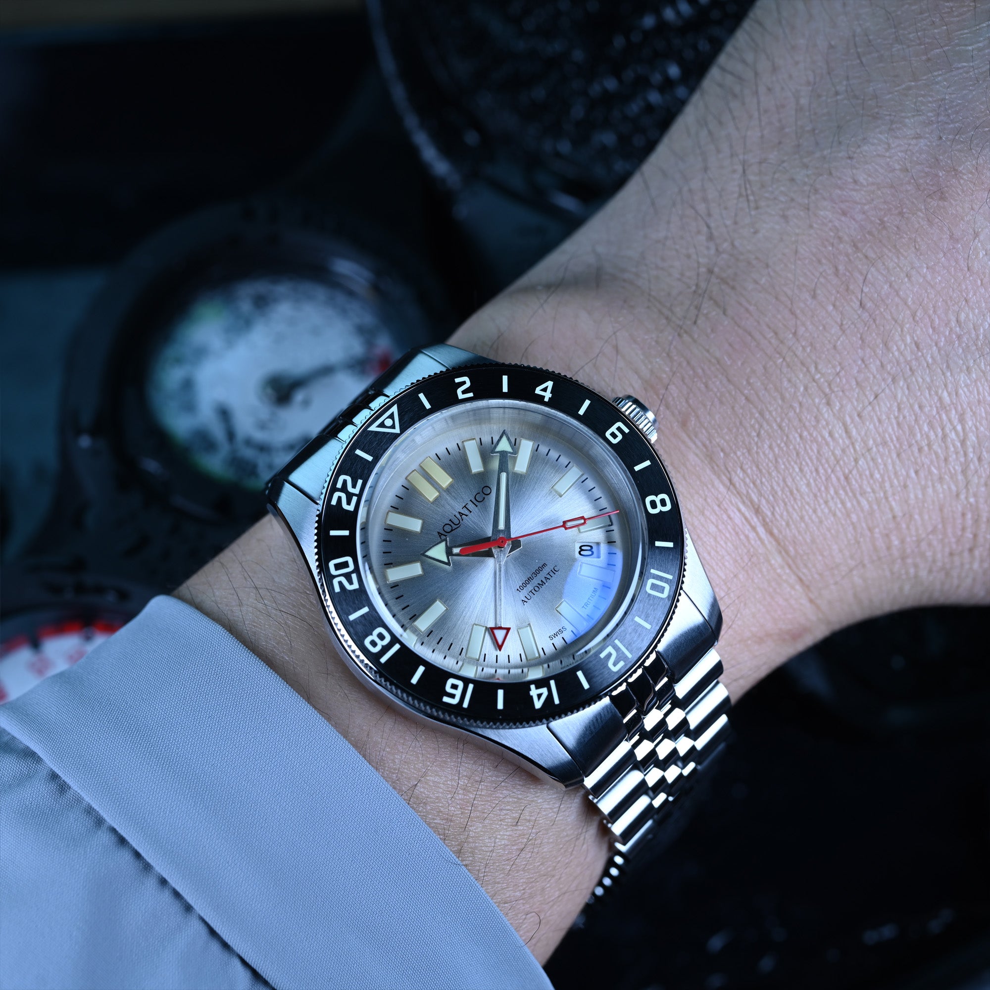 Silver dial automatic GMT tritium dive watch