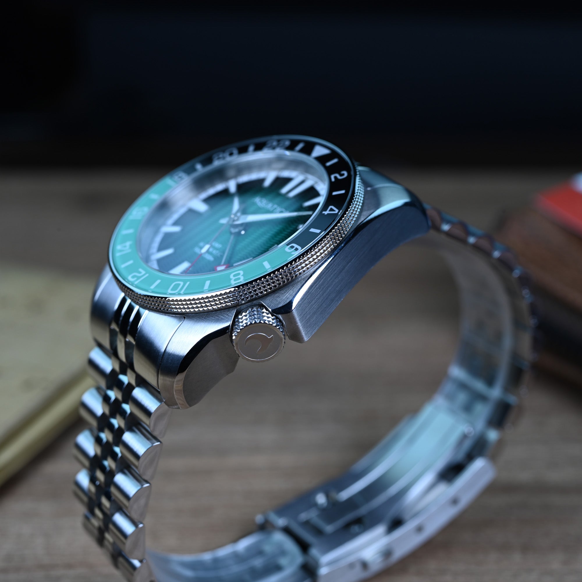 Aquatico green dial GMT dive watch with professional tool watch design