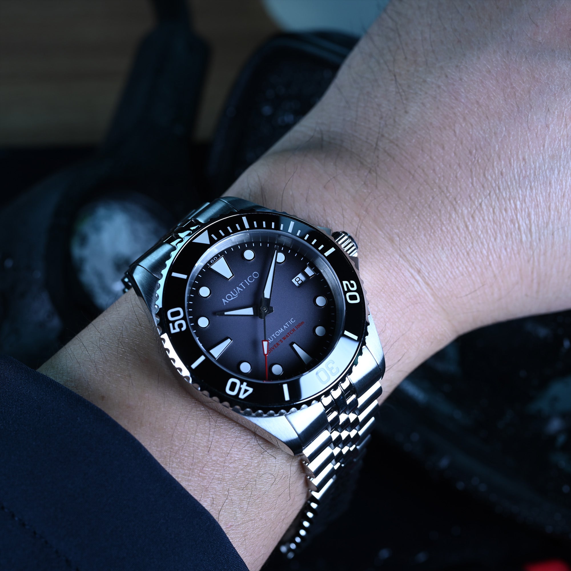 Affordable automatic black dial diver watch with luminous markers