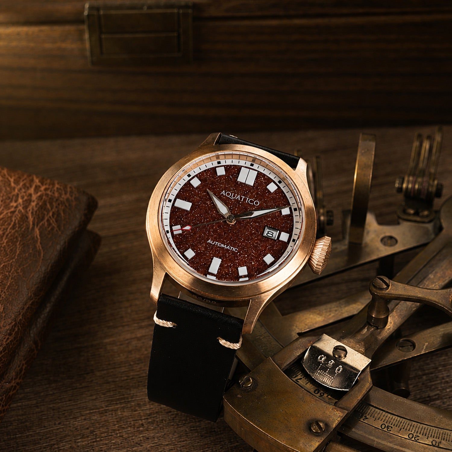 Bronze red aventurine dial watch with warm metallic tones and a distinctive handcrafted stone dial.