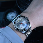Silver dial automatic GMT tritium dive watch