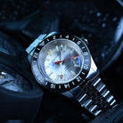 Automatic GMT tritium watch with silver dial and dive bezel
