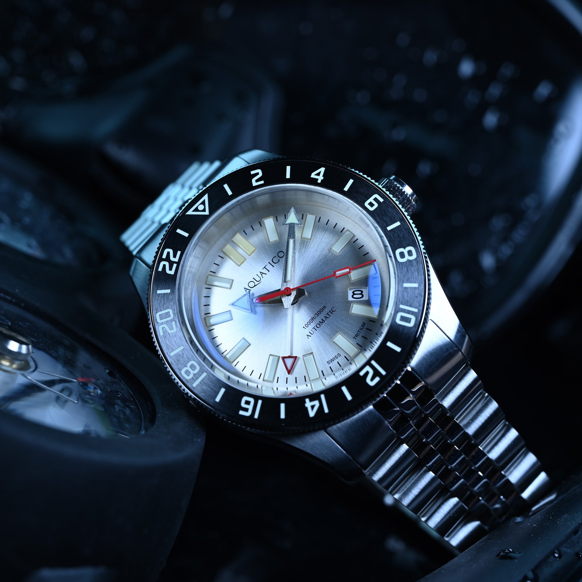 Automatic GMT tritium watch with silver dial and dive bezel