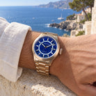 Aquatico bronze lapis lazuli dial watch worn on the wrist