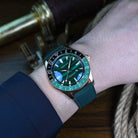 Aquatico bronze watch with green malachite stone dial