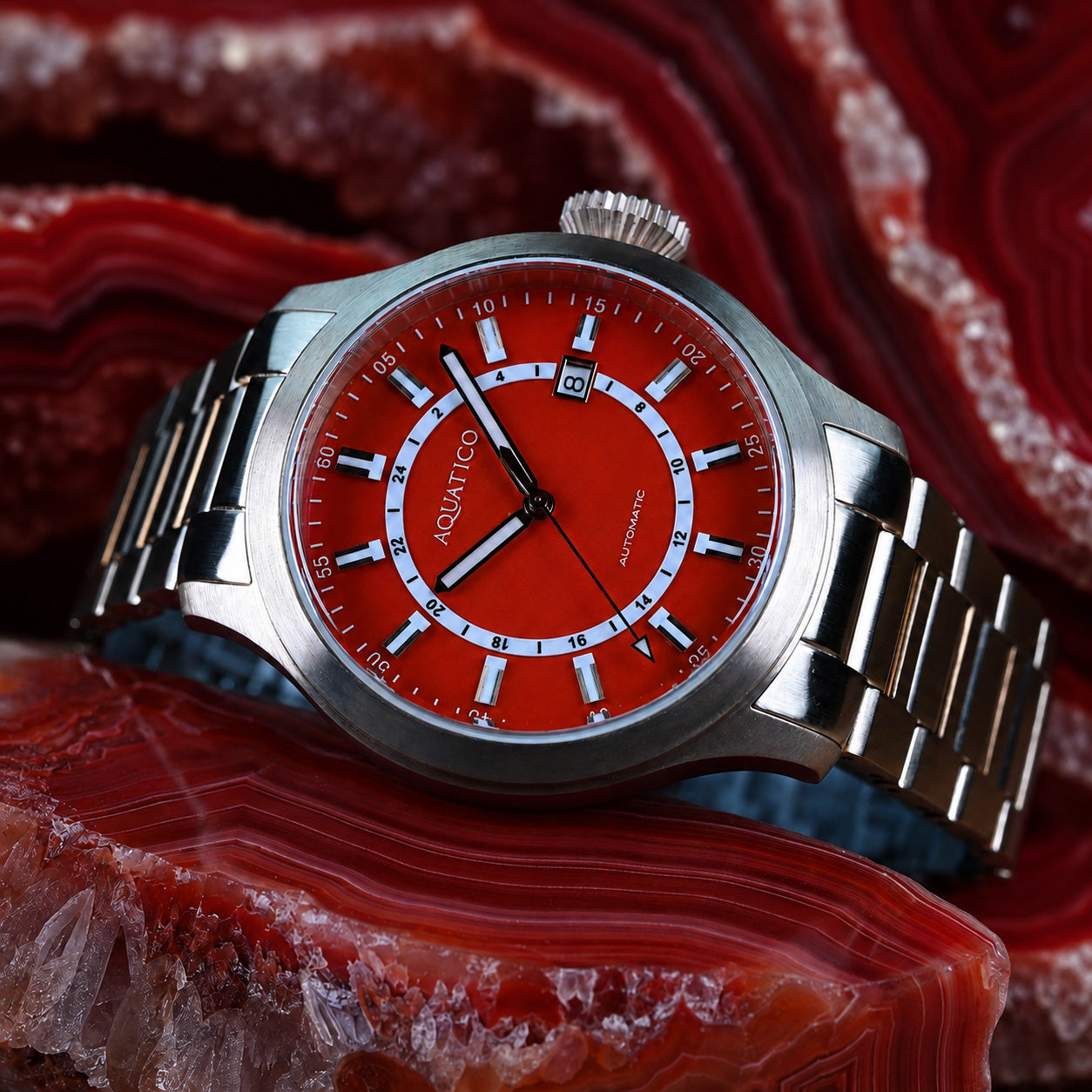 Luxury bronze watch featuring a deep red agate stone dial