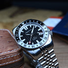 Men’s black dial dive GMT watch for travel and diving