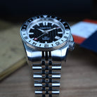 Automatic dive GMT watch with black dial and GMT hand