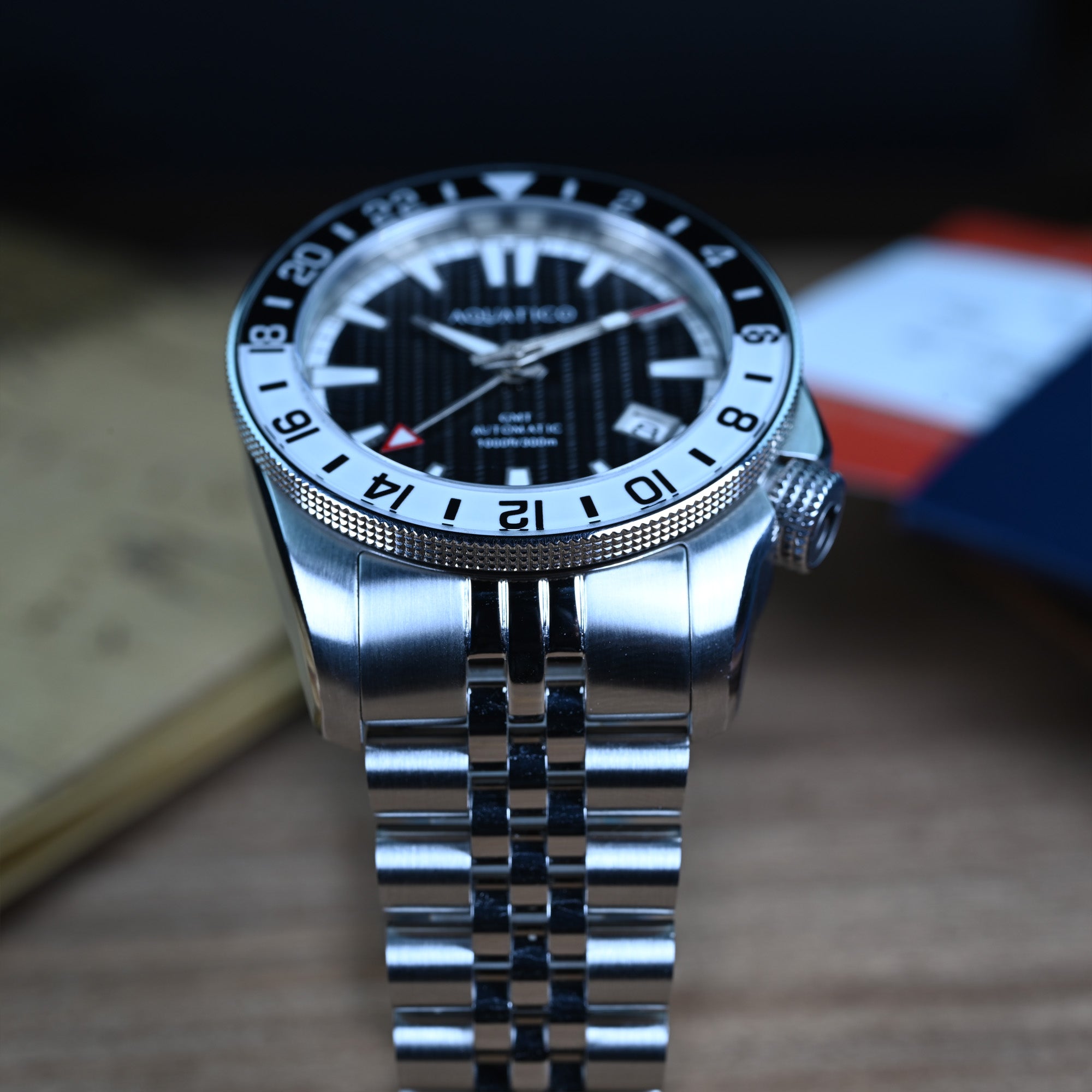 Automatic dive GMT watch with black dial and GMT hand