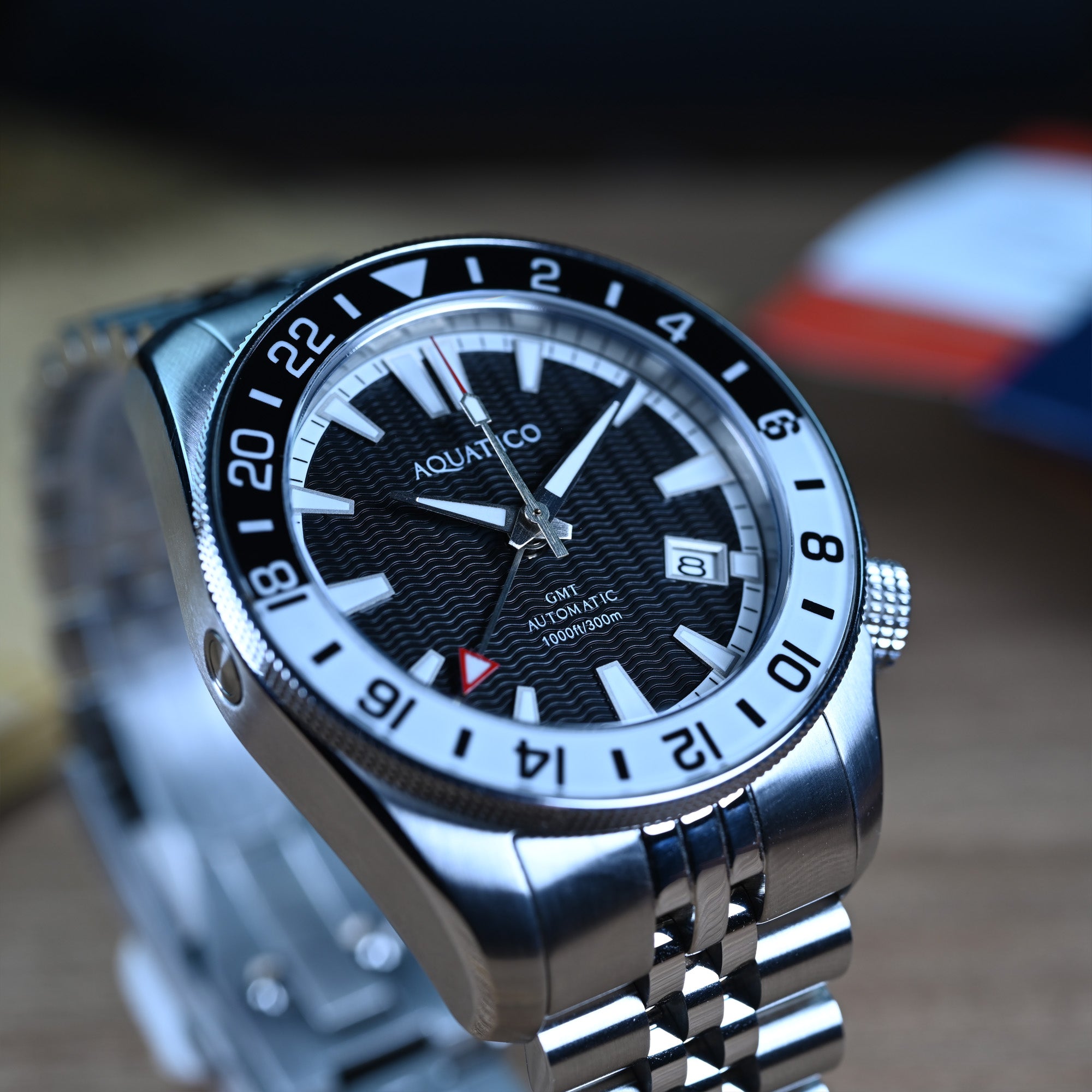 Aquatico black dial GMT dive watch with professional tool watch design
