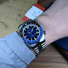 40mm blue dial automatic GMT dive watch on wrist