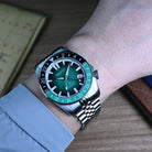 40mm green dial automatic GMT dive watch on wrist