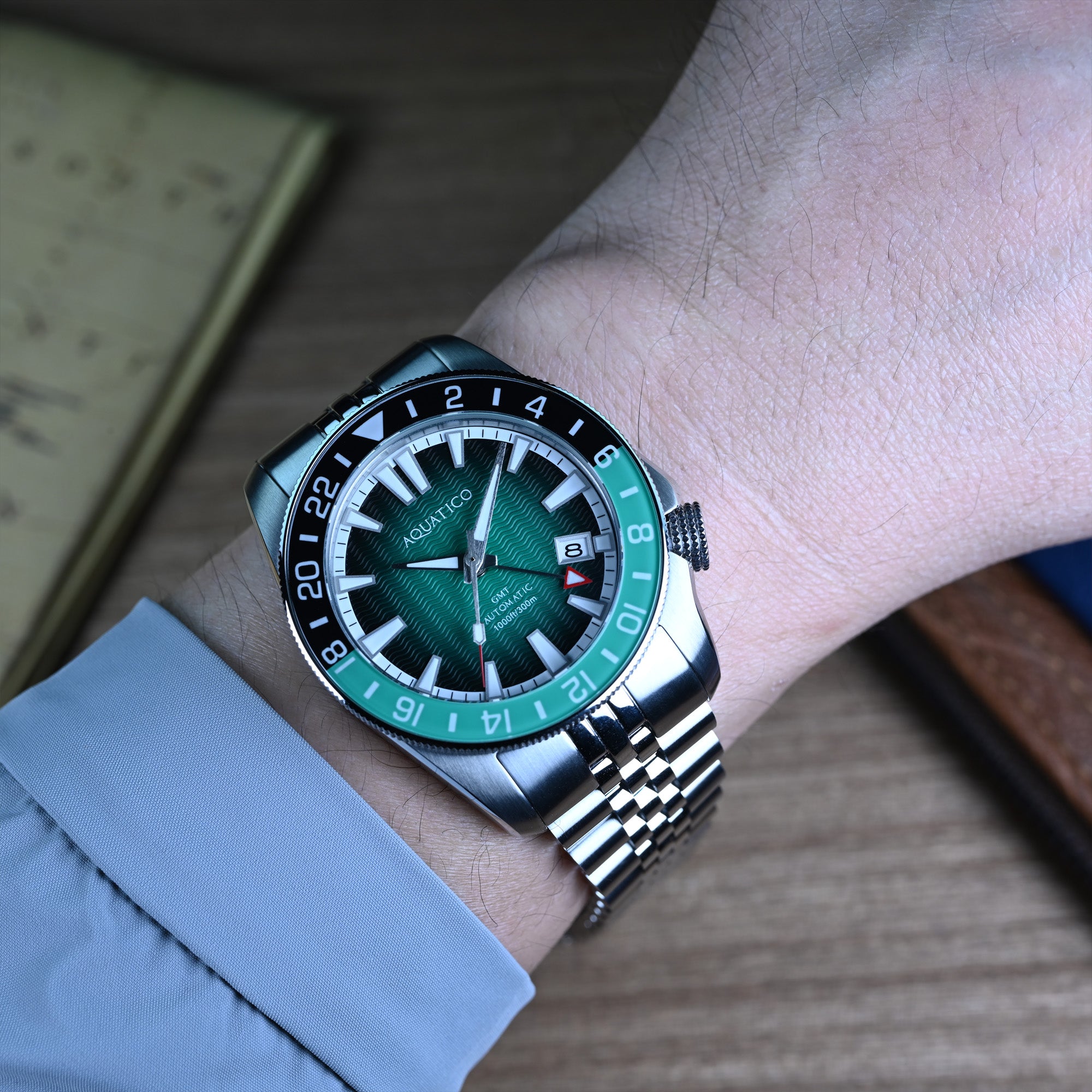 40mm green dial automatic GMT dive watch on wrist