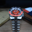 Men’s orange dial dive GMT watch for travel and diving