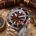 Bronze case automatic watch with textured red stone dial