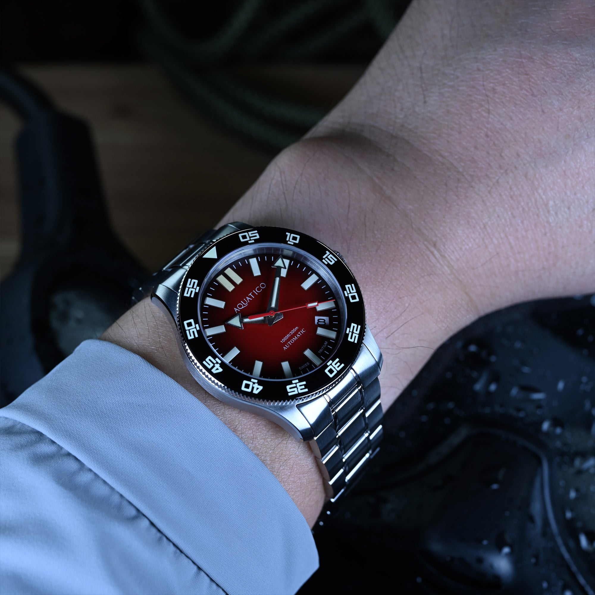 red dial automatic dive watch