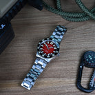 red dial tritium watch