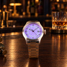 Aquatico purple jade dial watch with bronze case